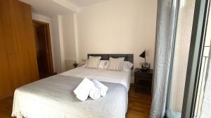 Postel nebo postele na pokoji v ubytování Acogedor apartamento by Prestigi