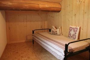 Ένα ή περισσότερα κρεβάτια σε δωμάτιο στο Alpe Monte Massella