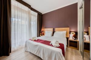 Voodi või voodid majutusasutuse EH Rome Airport Euro House Hotels toas