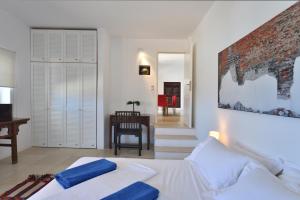 Ένα ή περισσότερα κρεβάτια σε δωμάτιο στο Villa Elea +27 φωτογραφίες