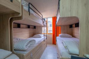 Postel nebo postele na pokoji v ubytování Oldcity Hostel + 6 fotografií