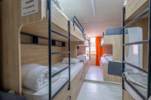 Postel nebo postele na pokoji v ubytování Oldcity Hostel