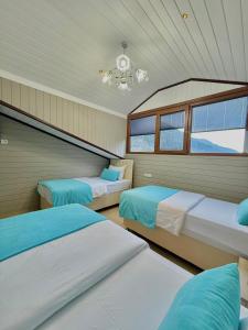 En eller flere senge i et værelse på Konak Grand Apart + 107 billeder