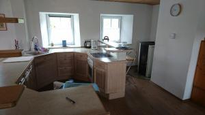 a kitchen with a sink and a counter top at Jurahaus Solnhofen in Solnhofen