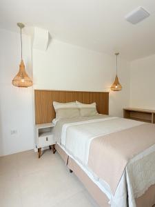 Postel nebo postele na pokoji v ubytování Flats Santa Luzia Trancoso