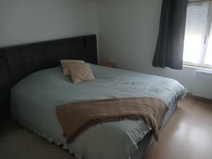 Ένα ή περισσότερα κρεβάτια σε δωμάτιο στο Studio