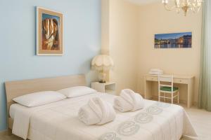 Postel nebo postele na pokoji v ubytování Villa Aladin