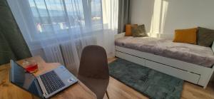 Una cama o camas en una habitación de Enjoy Liptov 11 fotos más