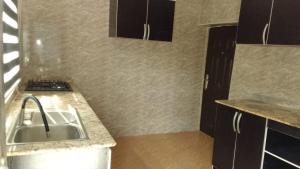 Kuchyň nebo kuchyňský kout v ubytování Ike Service Apartments