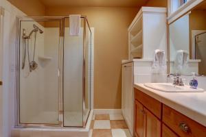a bathroom with a shower and a sink at Big Pine in Bend +13 photos