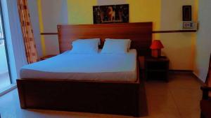 Ένα ή περισσότερα κρεβάτια σε δωμάτιο στο Marsu hotel