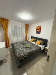 Postel nebo postele na pokoji v ubytování Apartament MARIO