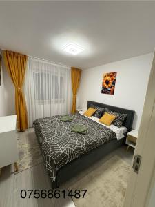 Postel nebo postele na pokoji v ubytování Apartament MARIO