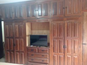 TV a/nebo společenská místnost v ubytování Casa Alto Padrão px ao Centro