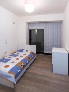 Ένα ή περισσότερα κρεβάτια σε δωμάτιο στο Hidden Sanctuary In Saronida
