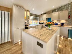 Kuchyň nebo kuchyňský kout v ubytování Haven Lodge - Uk50792