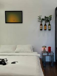 Postel nebo postele na pokoji v ubytování KINARI space