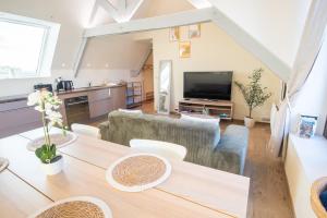 Kuchyň nebo kuchyňský kout v ubytování Loft cosy et lumineux, centre bourg par Groom*