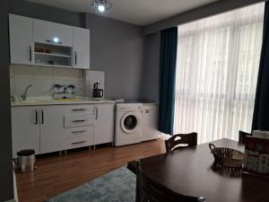 Kuchyň nebo kuchyňský kout v ubytování Samlife Apart