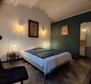 Postel nebo postele na pokoji v ubytování Villa de l'Olivier