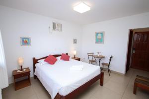 Ένα ή περισσότερα κρεβάτια σε δωμάτιο στο Pousada Acqua Azul