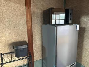 Köök või kööginurk majutusasutuses Kuwana Inn Kyomachi Nagashimaspa Land, Kasuga Taisha, Kuwana Station close to old private house