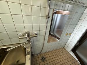 Vannituba majutusasutuses Kuwana Inn Kyomachi Nagashimaspa Land, Kasuga Taisha, Kuwana Station close to old private house +16 fotot