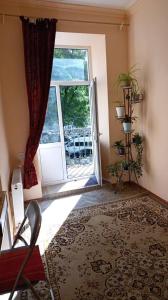 Ένα ή περισσότερα κρεβάτια σε δωμάτιο στο Karola Szymanowskiego 4 Home