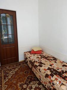 Ένα ή περισσότερα κρεβάτια σε δωμάτιο στο Karola Szymanowskiego 4 Home