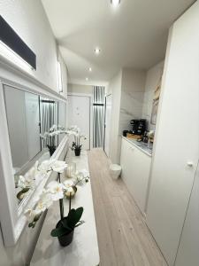 Kuchyň nebo kuchyňský kout v ubytování La Suite N4 exclusive rooms