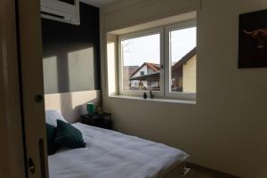 Postel nebo postele na pokoji v ubytování Modernes Apartment für Monteure, Projektteams und Durchreisende