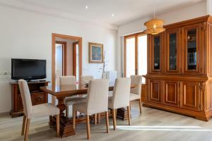 TV a/nebo společenská místnost v ubytování Dimore di Sant'Albino Montepulciano