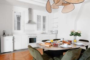 Η κουζίνα ή μικρή κουζίνα στο Le Marais élégant +11 φωτογραφίες