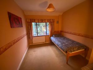 Giường trong phòng chung tại Mindful gentle soul