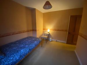 Giường trong phòng chung tại Mindful gentle soul