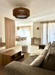 Χώρος καθιστικού στο Appartement La Vieille Maison Le joyau rénové