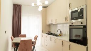 Kuchyň nebo kuchyňský kout v ubytování FLH - Amilar Studio