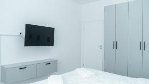 TV a/nebo společenská místnost v ubytování FLH - Amilar Studio