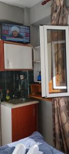 Kuchyň nebo kuchyňský kout v ubytování Thomas ROOM + 15 fotografií