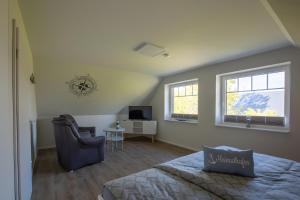 Μια τηλεόραση ή/και κέντρο ψυχαγωγίας στο Ferienhaus Koch