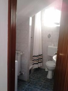 Koupelna v ubytování Apartments Veda