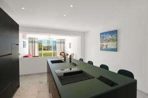 Οι επιχειρηματικές εγκαταστάσεις ή/και οι αίθουσες συνεδριάσεων στο Les appartements du Flamboyant vu sur le lagon