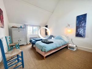 Postel nebo postele na pokoji v ubytování COC - Villa Saint George