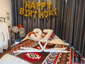 Ένα ή περισσότερα κρεβάτια σε δωμάτιο στο วันเดย์ภูทับเบิก