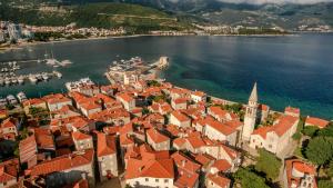 an aerial view of a town by the water at Apartments Spin in Budva