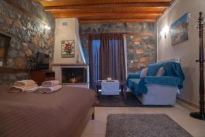 Ένα ή περισσότερα κρεβάτια σε δωμάτιο στο ΞΕΝΩΝΑΣ ΘΕΑ