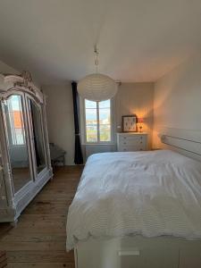 En eller flere senge i et værelse på L'Instant Baie, Maison cosy proche centre