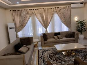 Posezení v ubytování KumKum Apartments