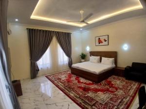 Postel nebo postele na pokoji v ubytování KumKum Apartments