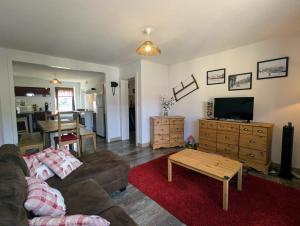TV a/nebo společenská místnost v ubytování les piperiens